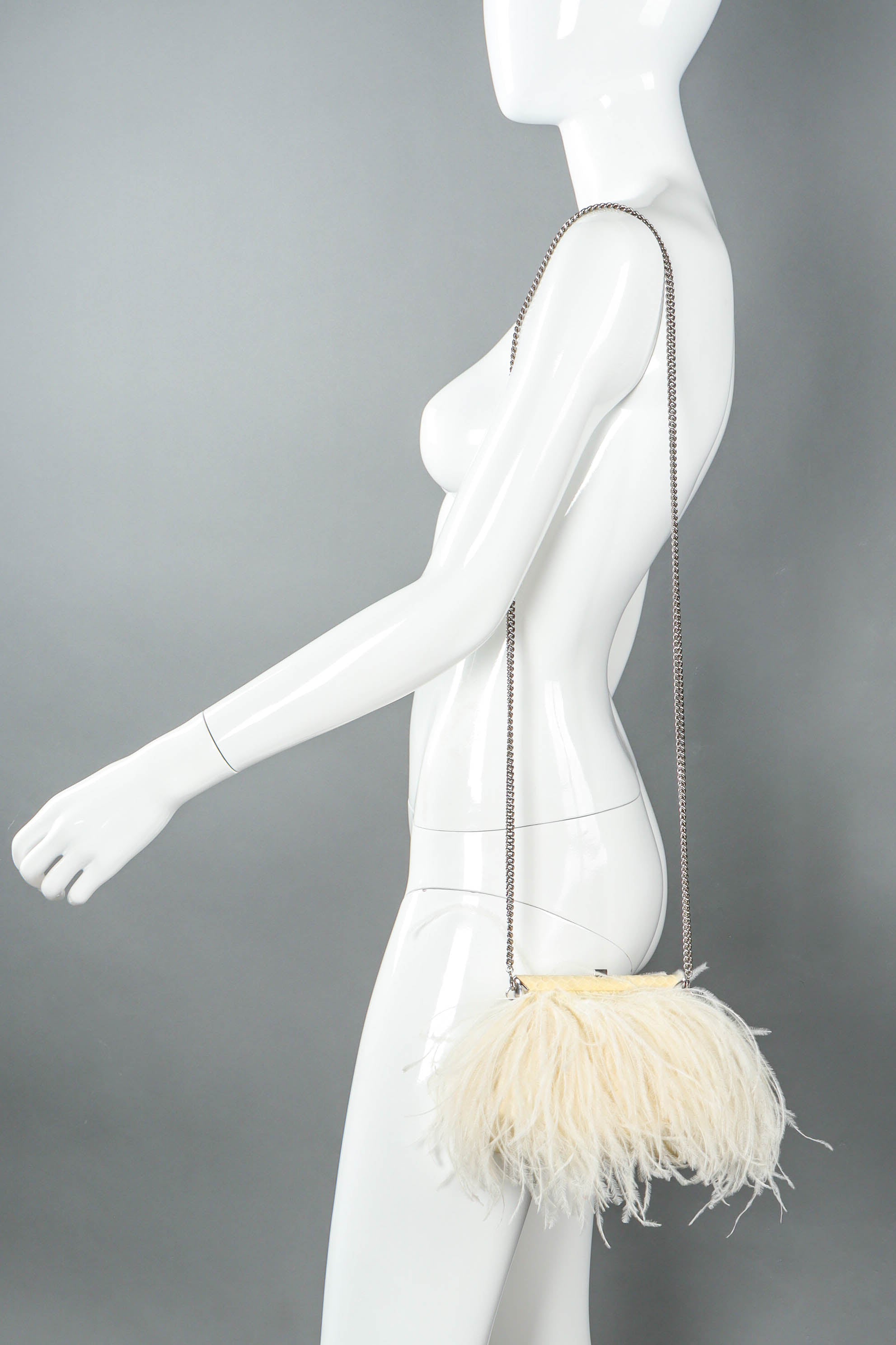 Vintage Ralph Lauren Creamy Ostrich Clutch on mannequin shoulder @ Recess LA