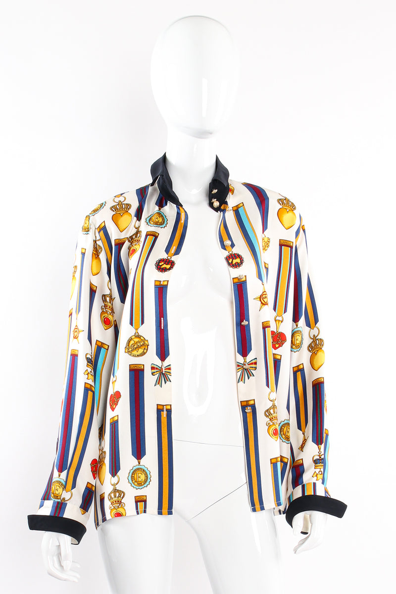 Vintage Escada Glamour Medals of Honor Print Blouse on mannequin open at Recess Los Angeles