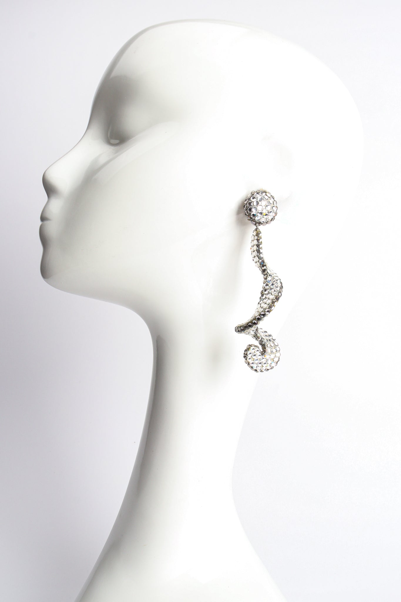 Vintage Richard Kerr Crystal Rhinestone Swirl Drop Earrings on mannequin at Recess Los Angeles