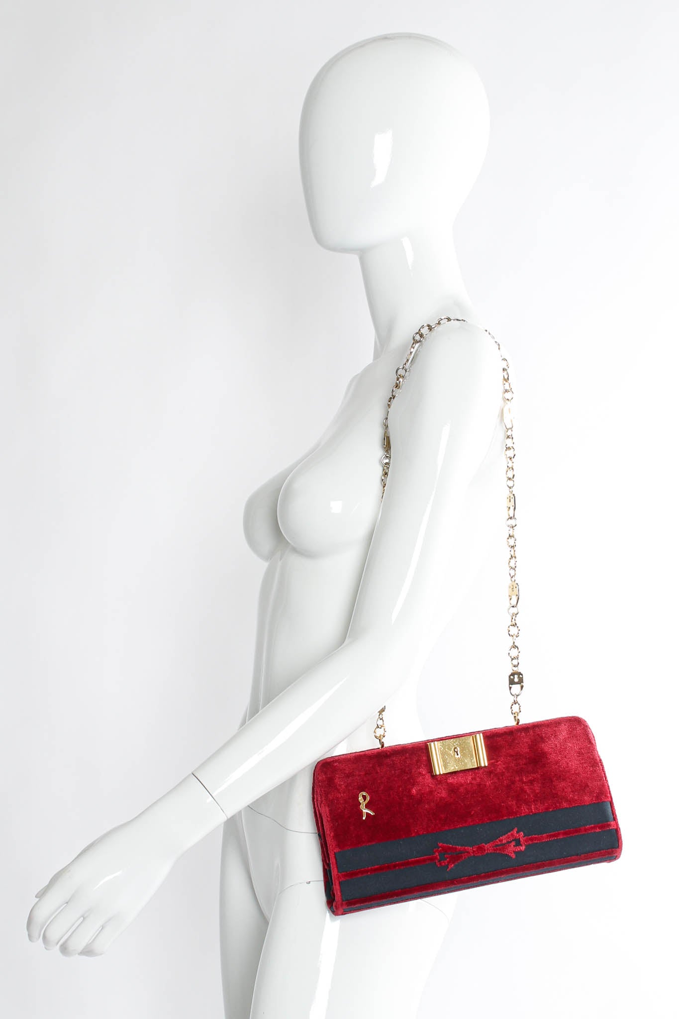 Vintage Roberta Di Camerino Envelope Clutch Motif Bag on mannequin @ Recess Los Angeles