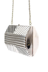 Saks Fifth Avenue metal silver clutch product shot @recessla