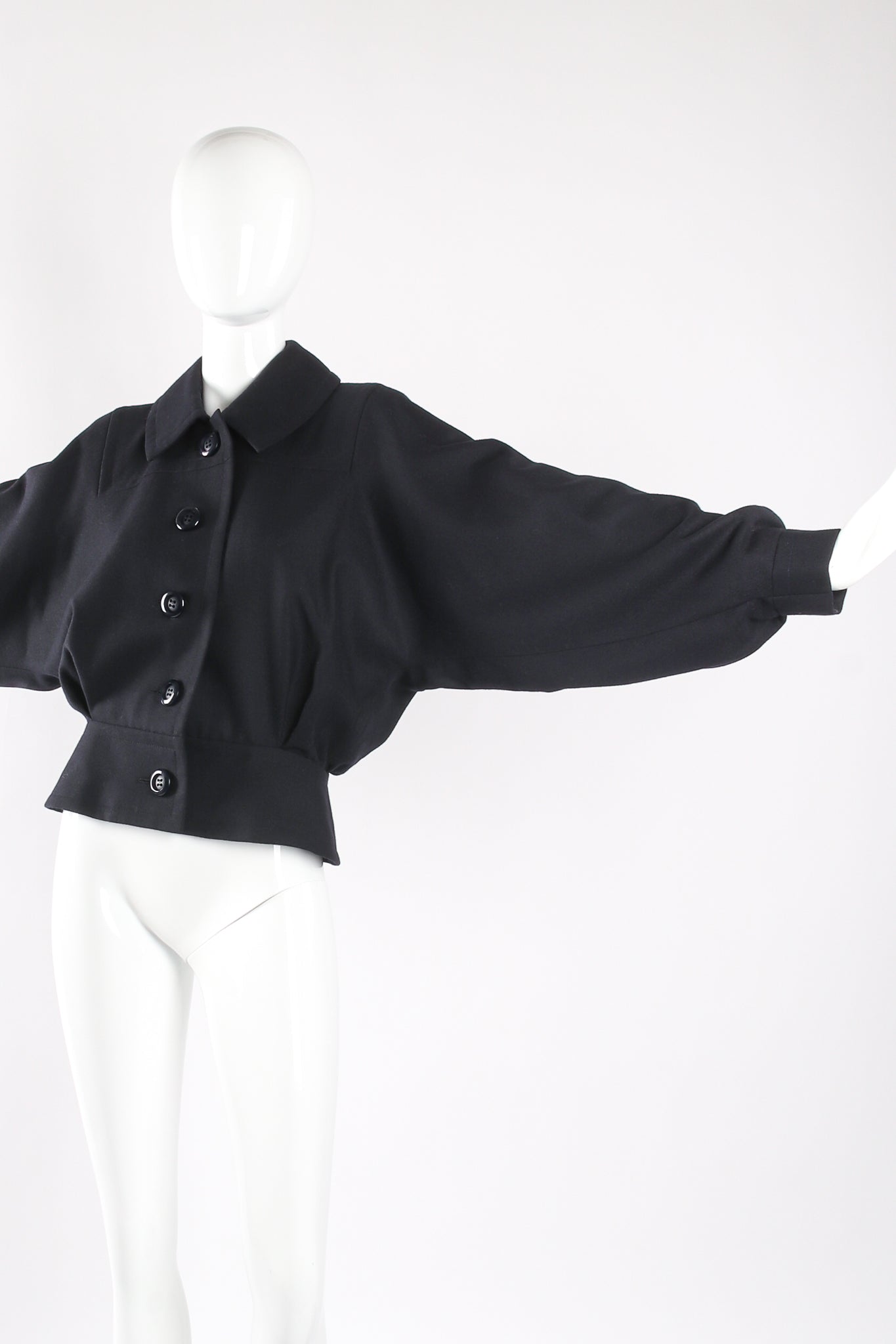 Batwing Uniform Peplum Jacket & Skirt Set sleeve on mannequin at Recess LA