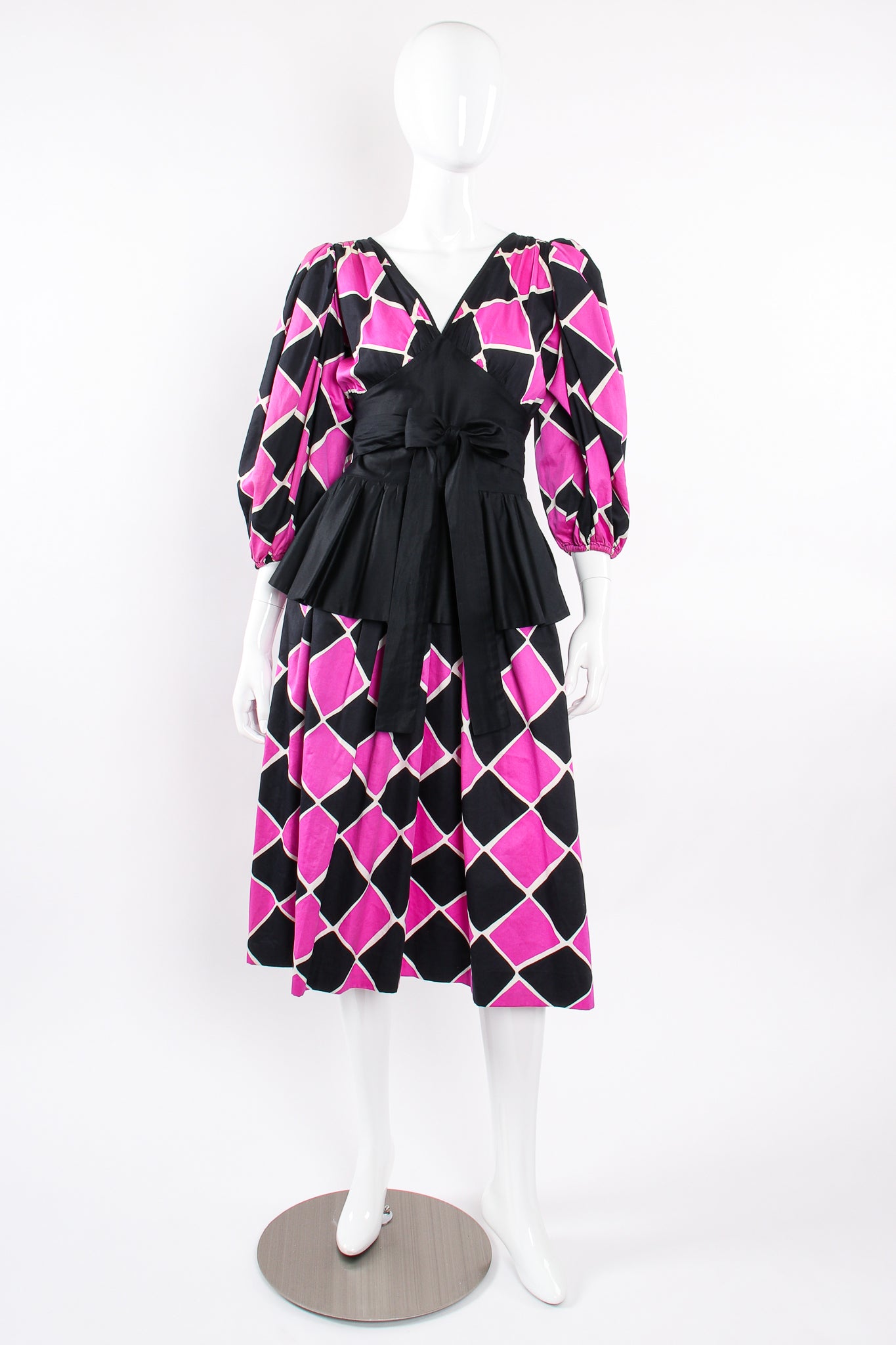 Vintage YSL Yves Saint Laurent Harlequin Balloon Sleeve Peplum Dress Mannequin front @ Recess LA