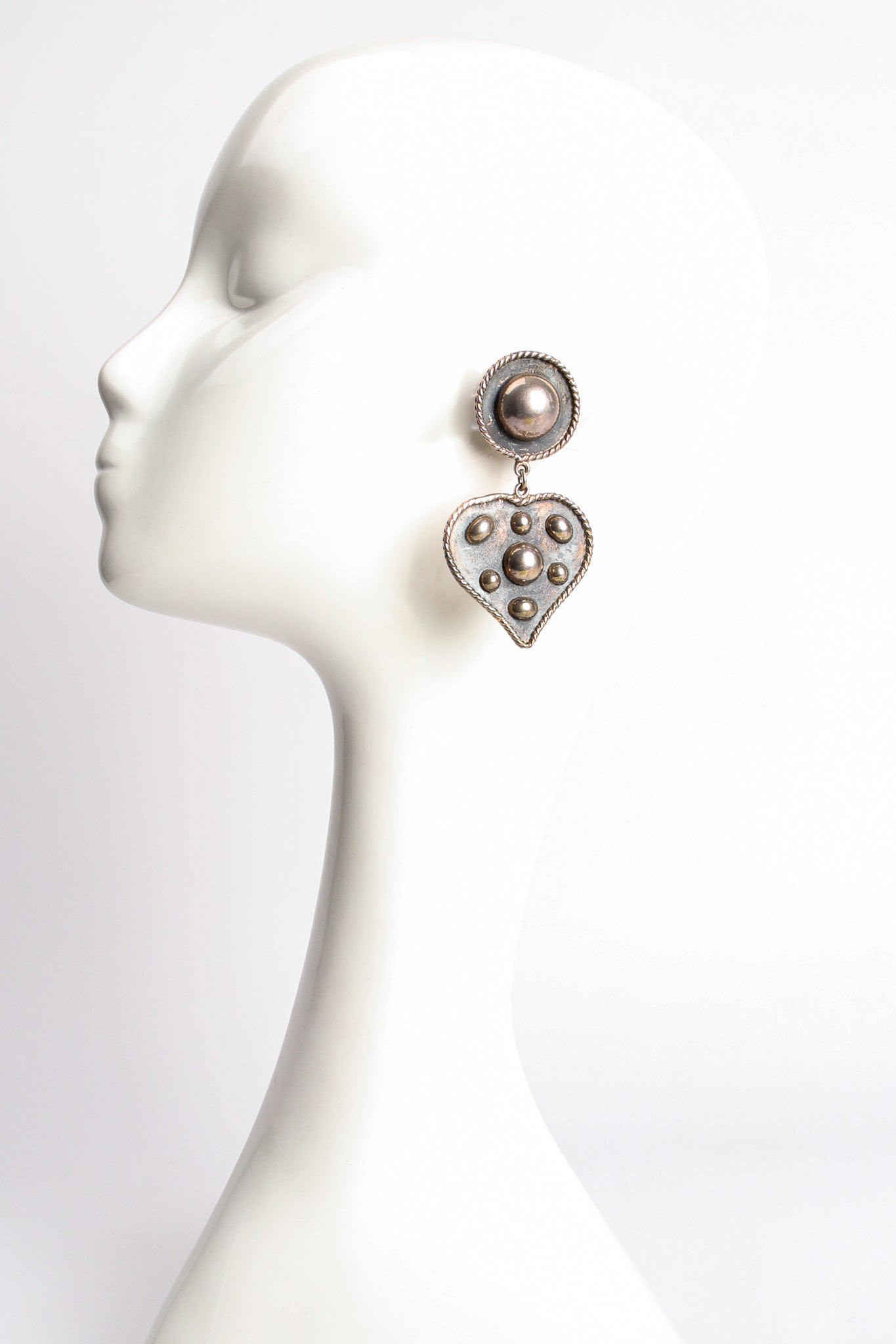 Vintage Brenda Schoenfeld 1992 Sterling Silver Heart Drop Earrings on mannequin at Recess Los Angeles