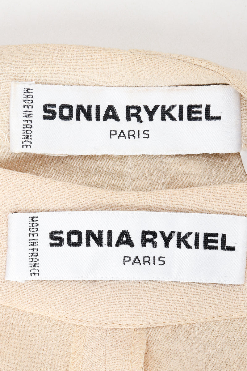 Vintage Sonia Rykiel labels on beige fabric