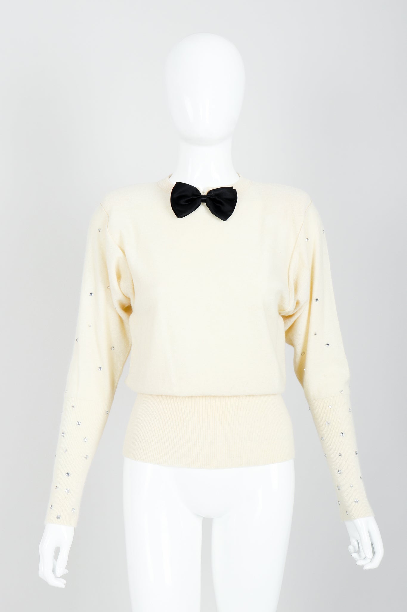 Vintage Sonia Rykiel Cream Knit Bow Tie Sweater on Mannequin front At Recess