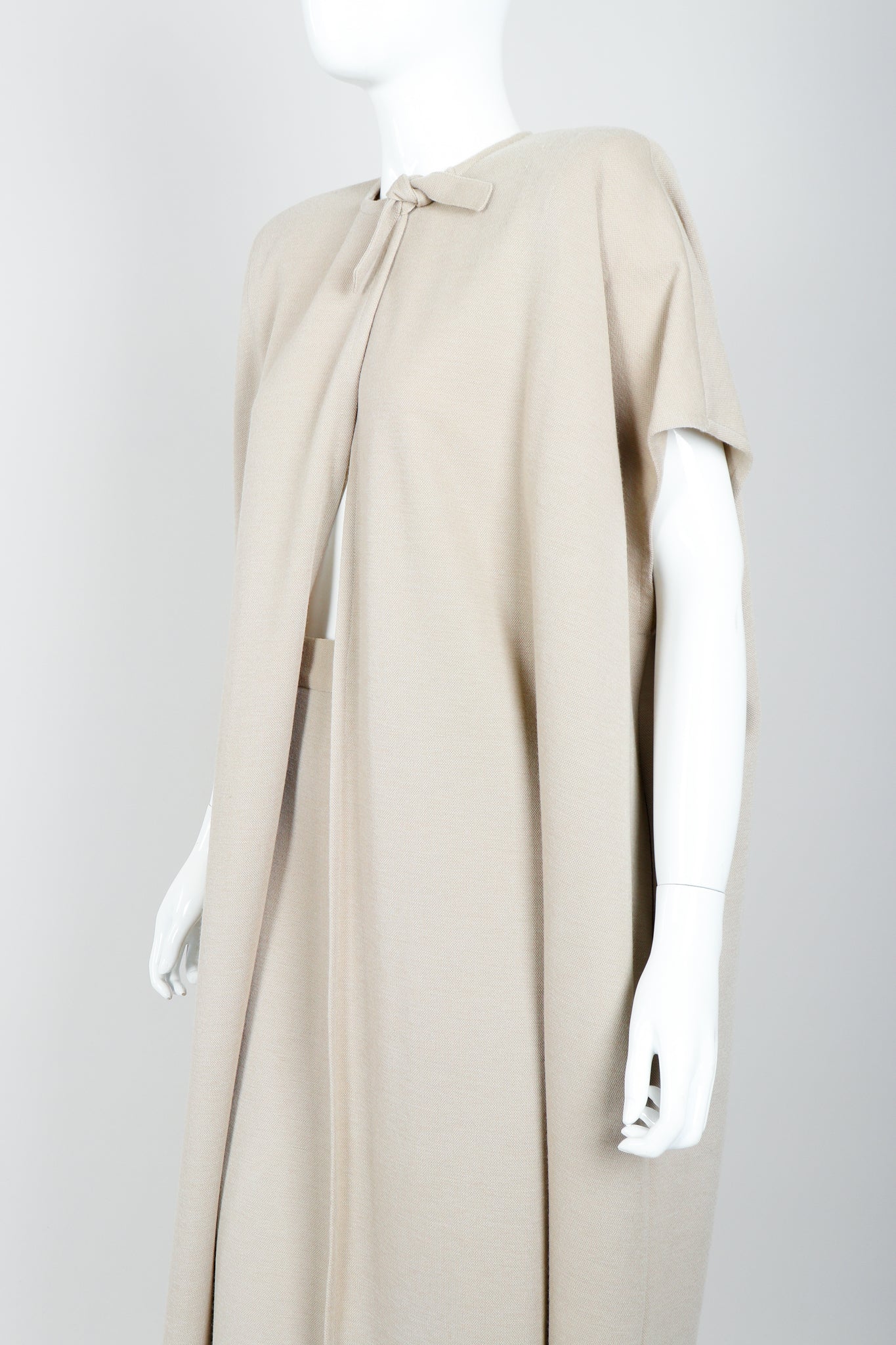 Vintage Sonia Rykiel Sand Beige Knit Cape & Skirt Set on Mannequin angled at Recess