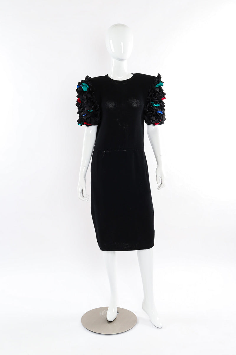 Black sweater knit dress with satin confetti ruffle sleeves by St. John mannequin front @recessla