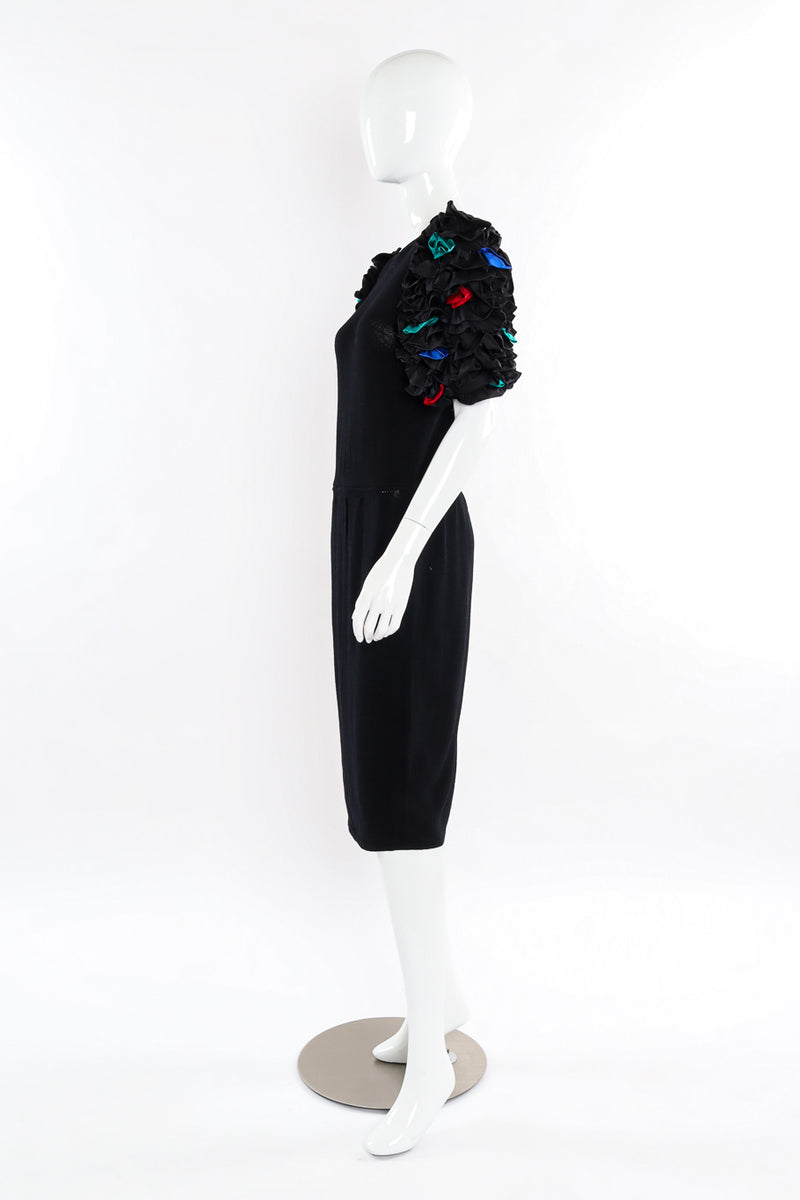 Black sweater knit dress with satin confetti ruffle sleeves by St. John mannequin side @recessla