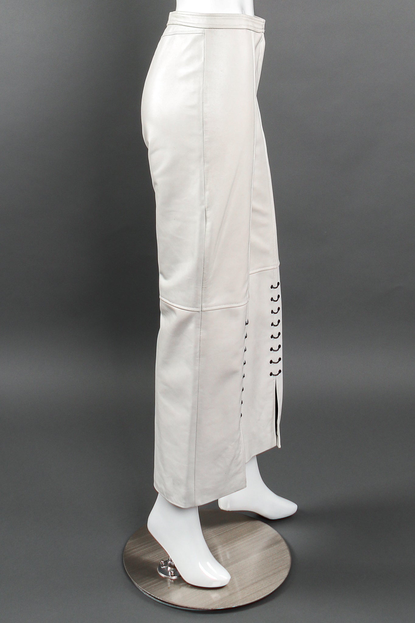 Vintage St. John Chained Leather Tank & Pant Set on mannequin pant side at Recess LA