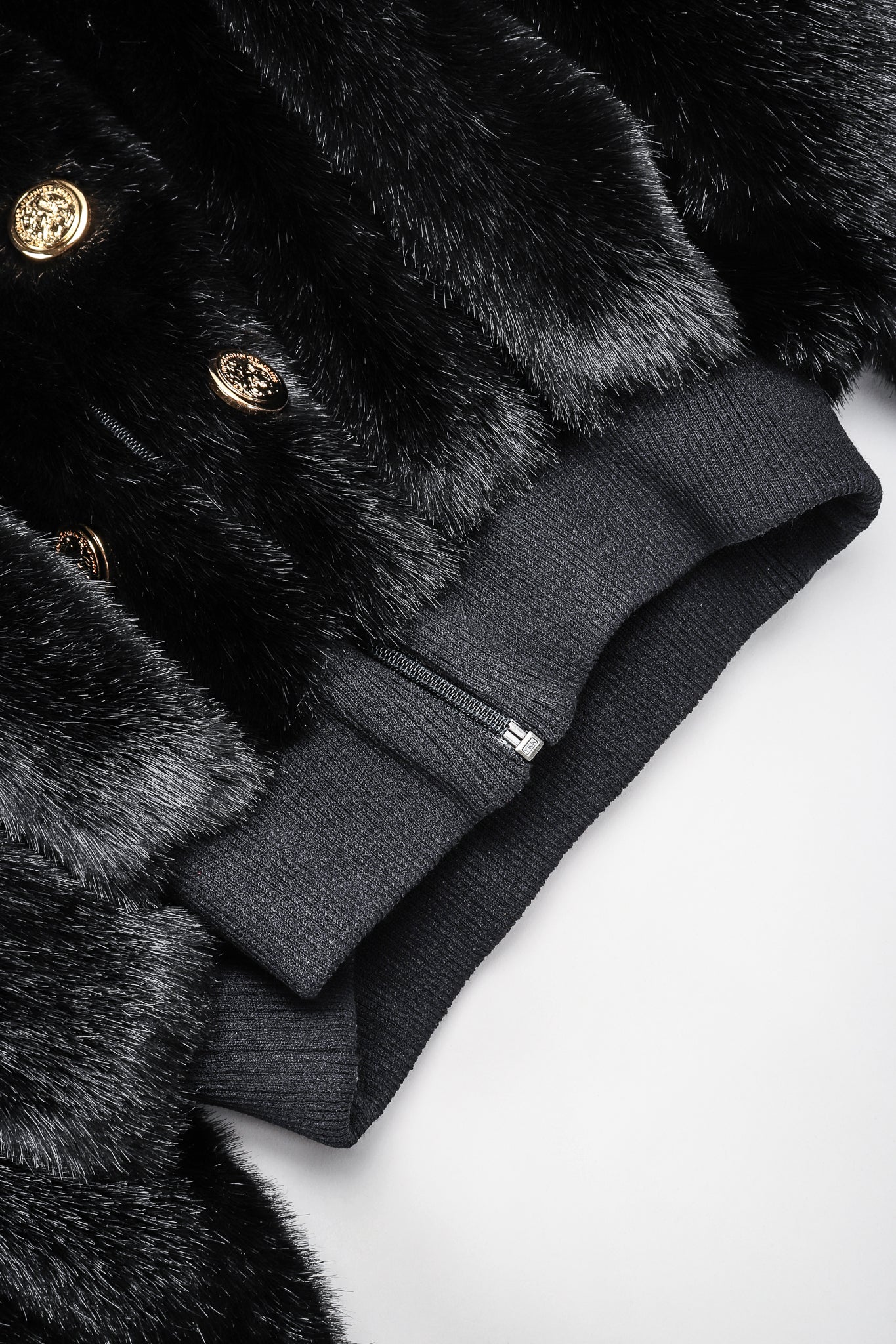 Recess Vintage St. John black faux fur bomber jacket, waistband detail