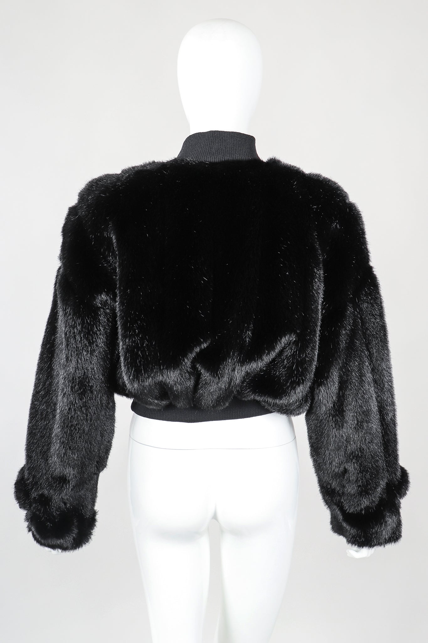 Recess Vintage St. John cropped black faux fur bomber jacket on mannnequin, Back