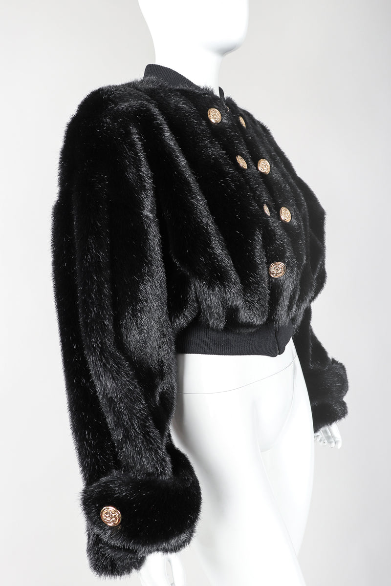 Recess Vintage St. John cropped blk faux fur bomber jacket on mannnequin, angled
