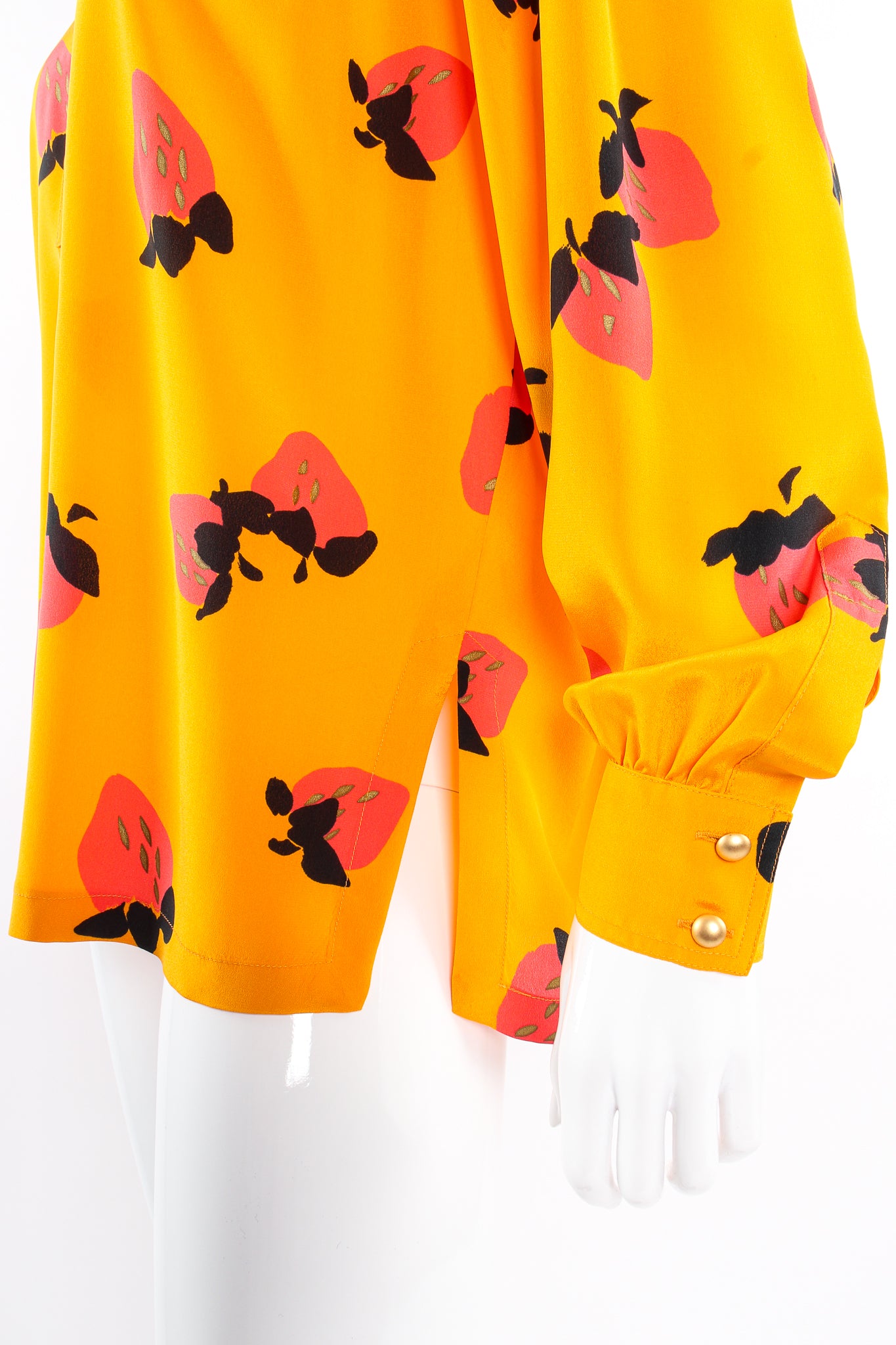 Vintage Escada Graphic Strawberry Print Blouse on Mannequin sleeve cuff at Recess Los Angeles