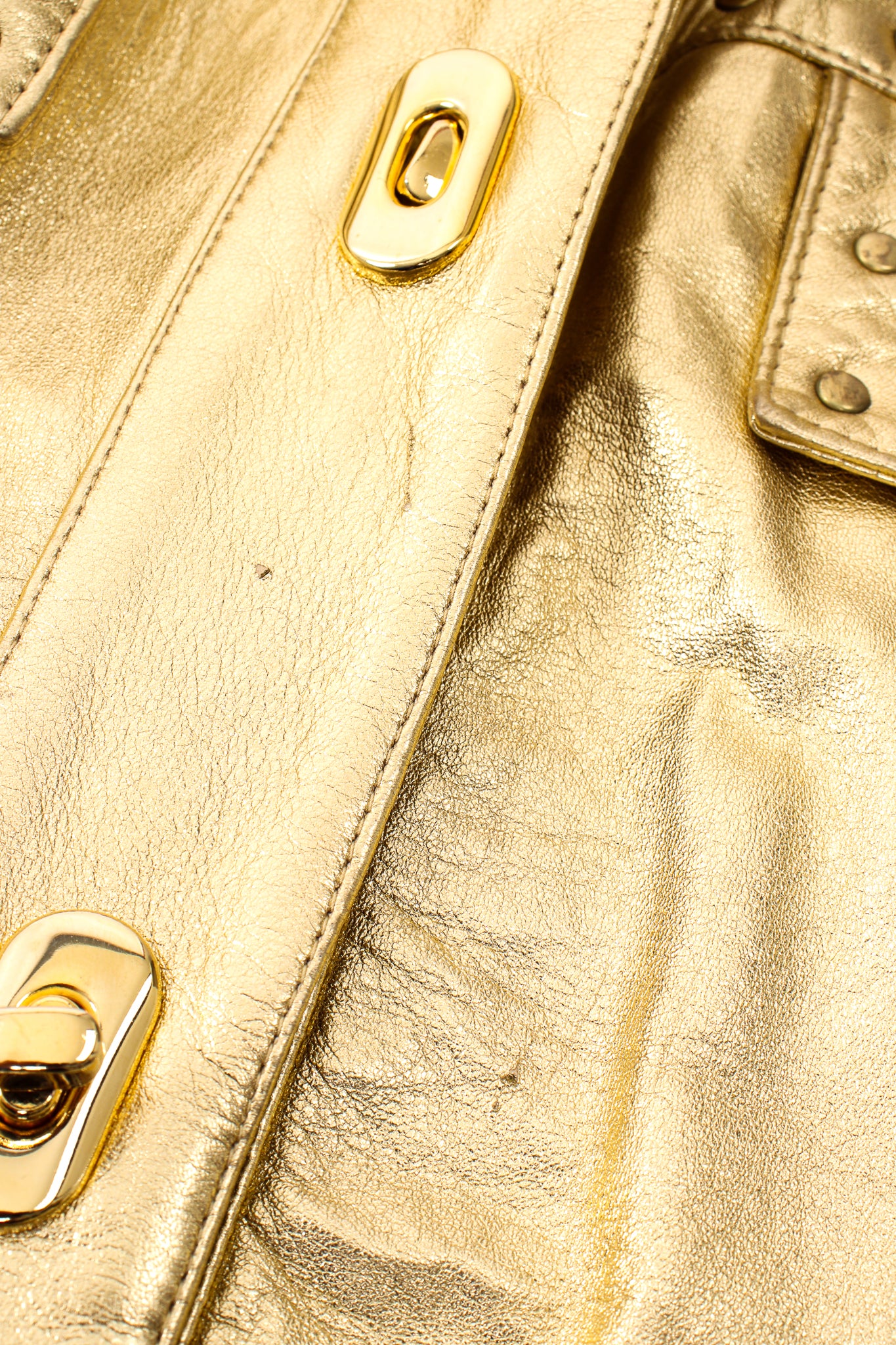 Vintage Suzelle Gold Leather Turnlock Jacket scratches at Recess Los Angeles