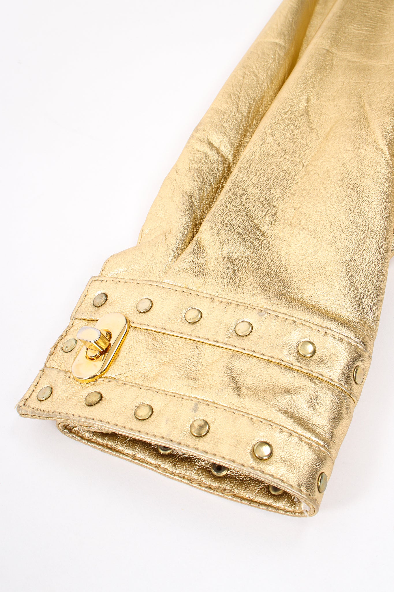 Vintage Suzelle Gold Leather Turnlock Jacket sleeve cuff at Recess Los Angeles