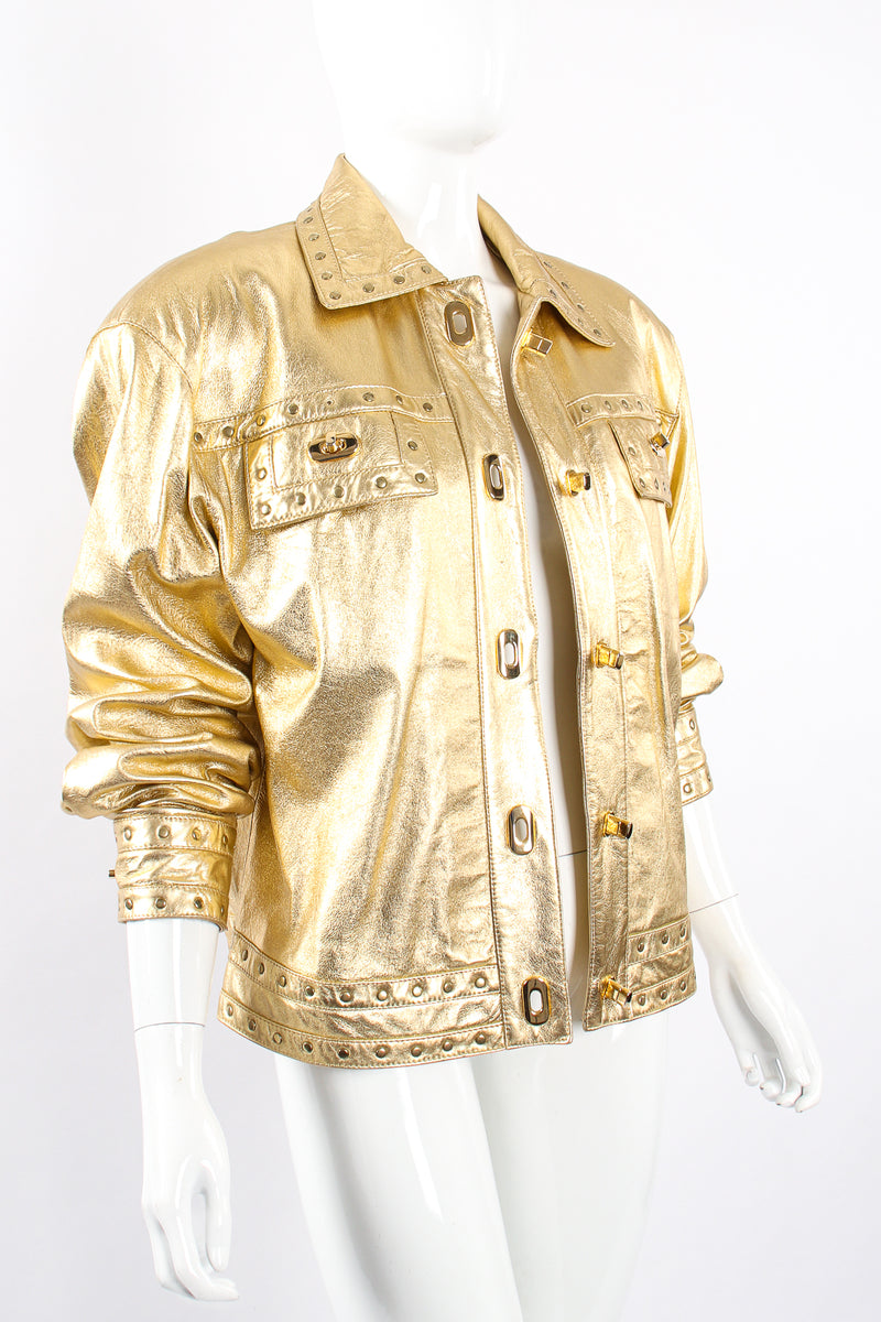 Vintage Suzelle Gold Leather Turnlock Jacket on Mannequin angle at Recess Los Angeles