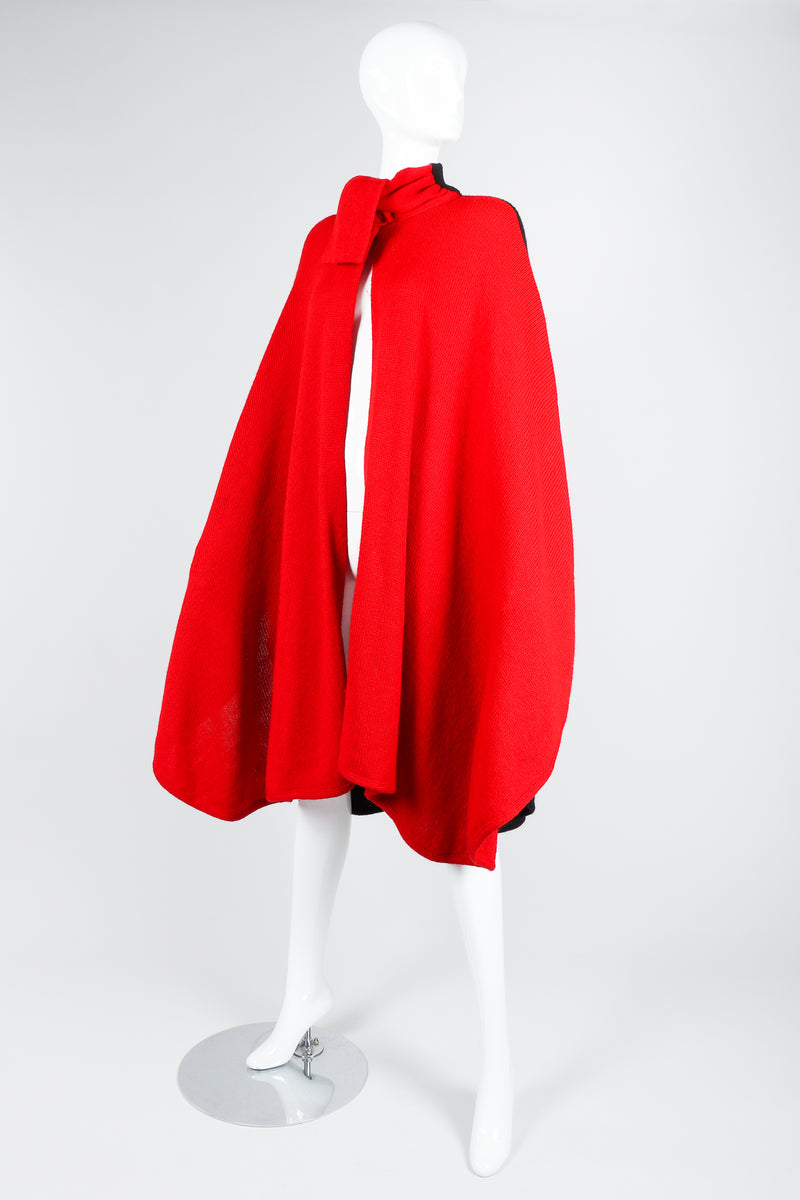 Recess Vintage Valentino Red And Black Sweater Knit Cape on Mannequin, arms at sides
