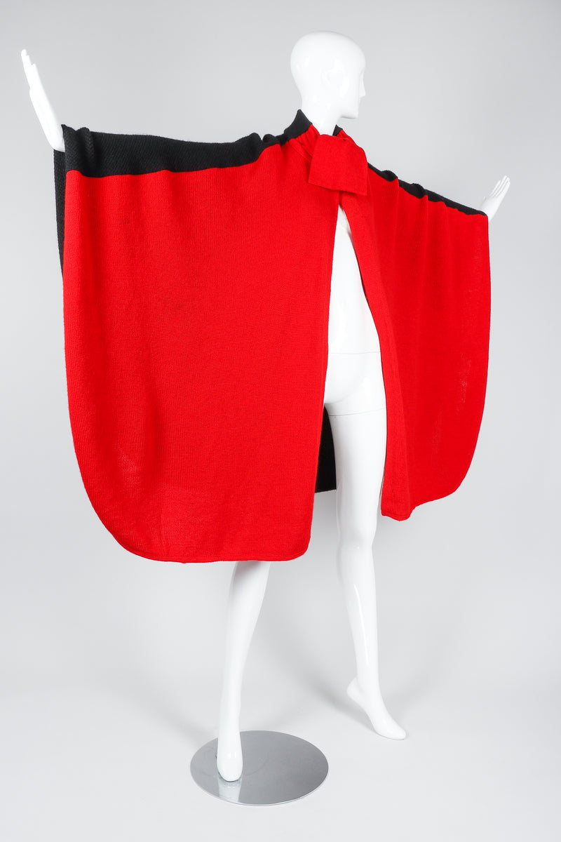 Recess Vintage Valentino Red And Black Sweater Knit Cape on Mannequin, arms extended