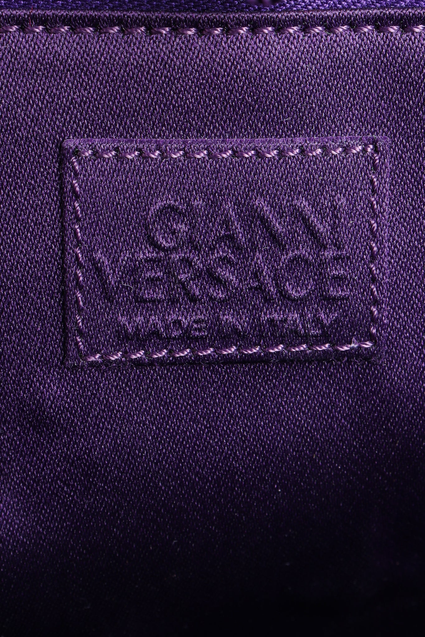 Vintage Gianni Versace Velvet Swirl O-Ring Bag label at Recess Los Angeles
