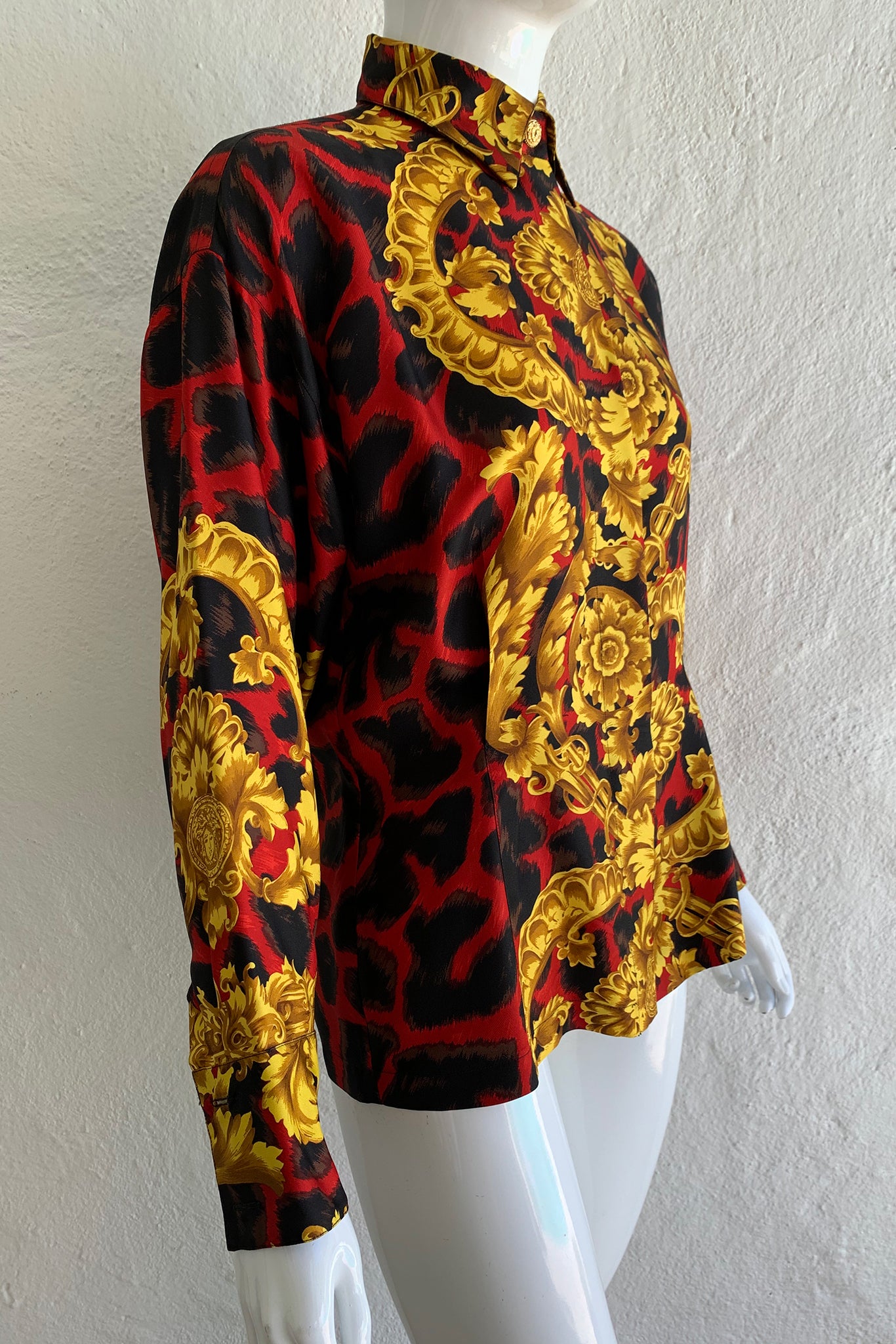 Vintage Gianni Versace Baroque Animal Print Silk Shirt on Mannequin angle crop at Recess