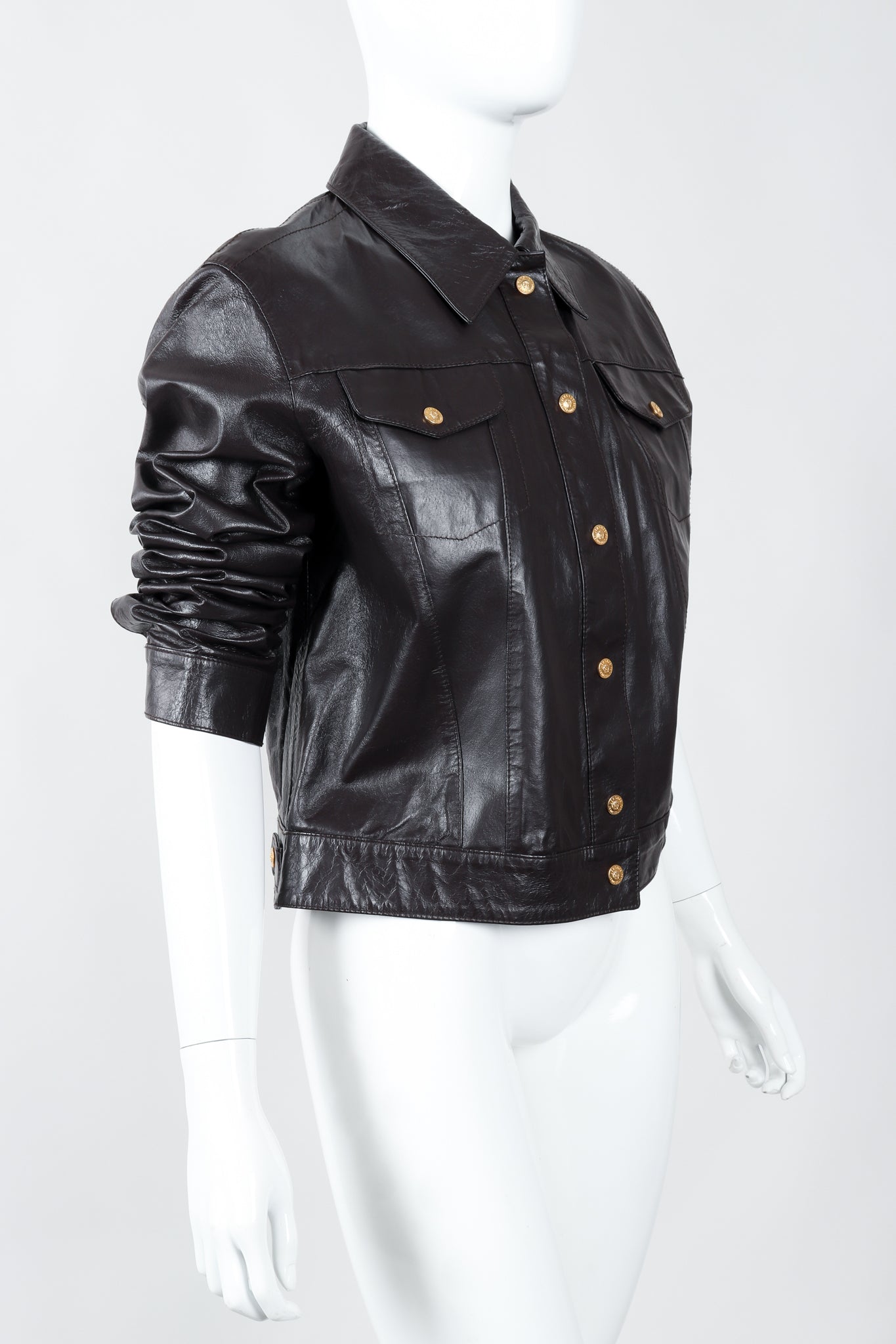 Vintage Versace Jeans Couture Dark Chocolate Leather Jean Jacket on Mannequin angled at Recess