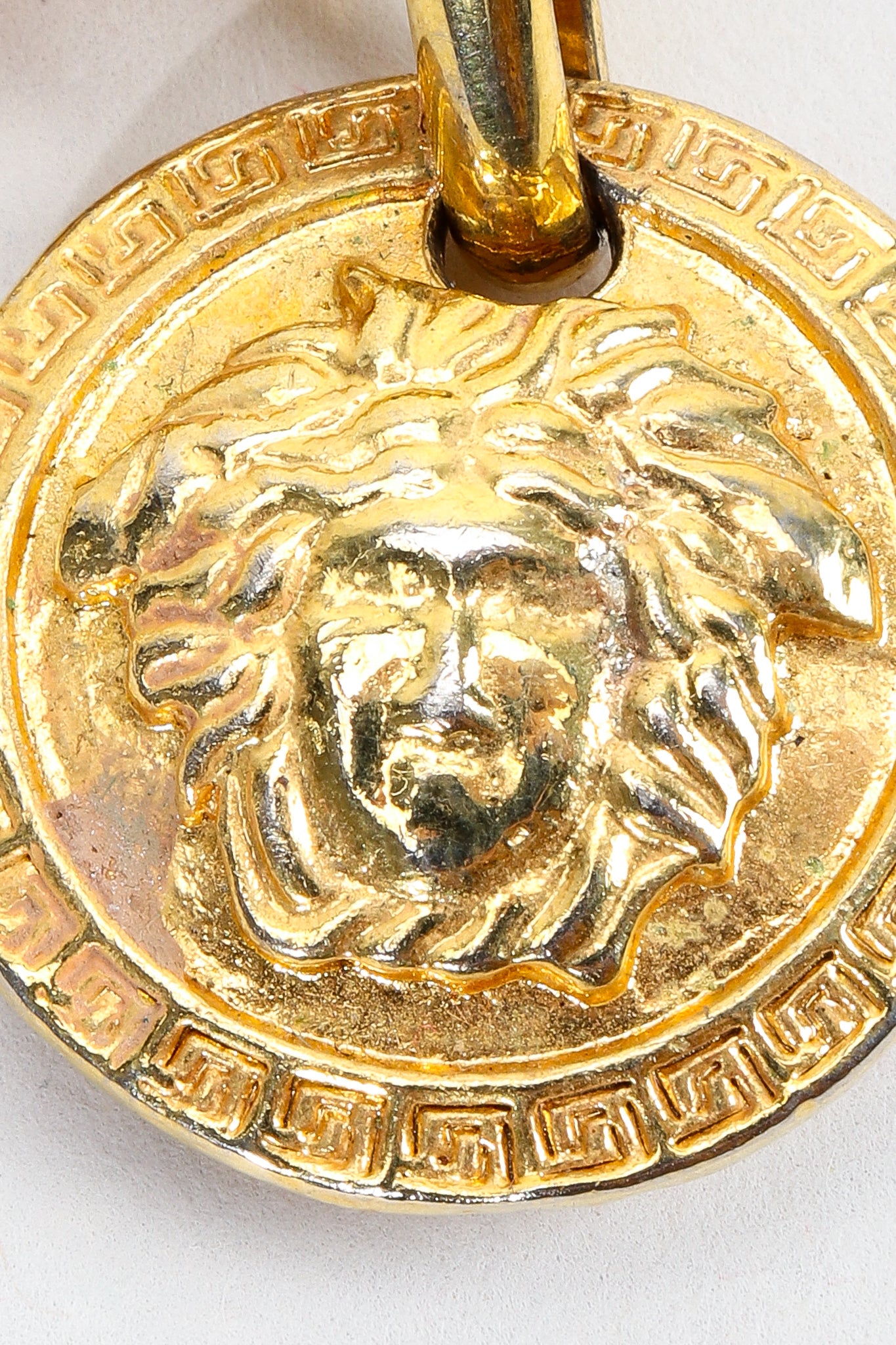 Vintage Gianni Versace Gold Medusa Head coin detail 