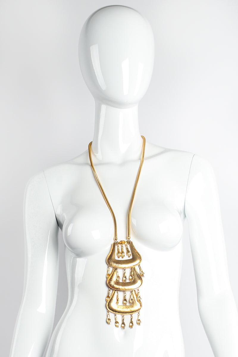 Vintage William deLillo Tiny Hand Tiered Buckle Pendant on mannequin at Recess Los Angeles