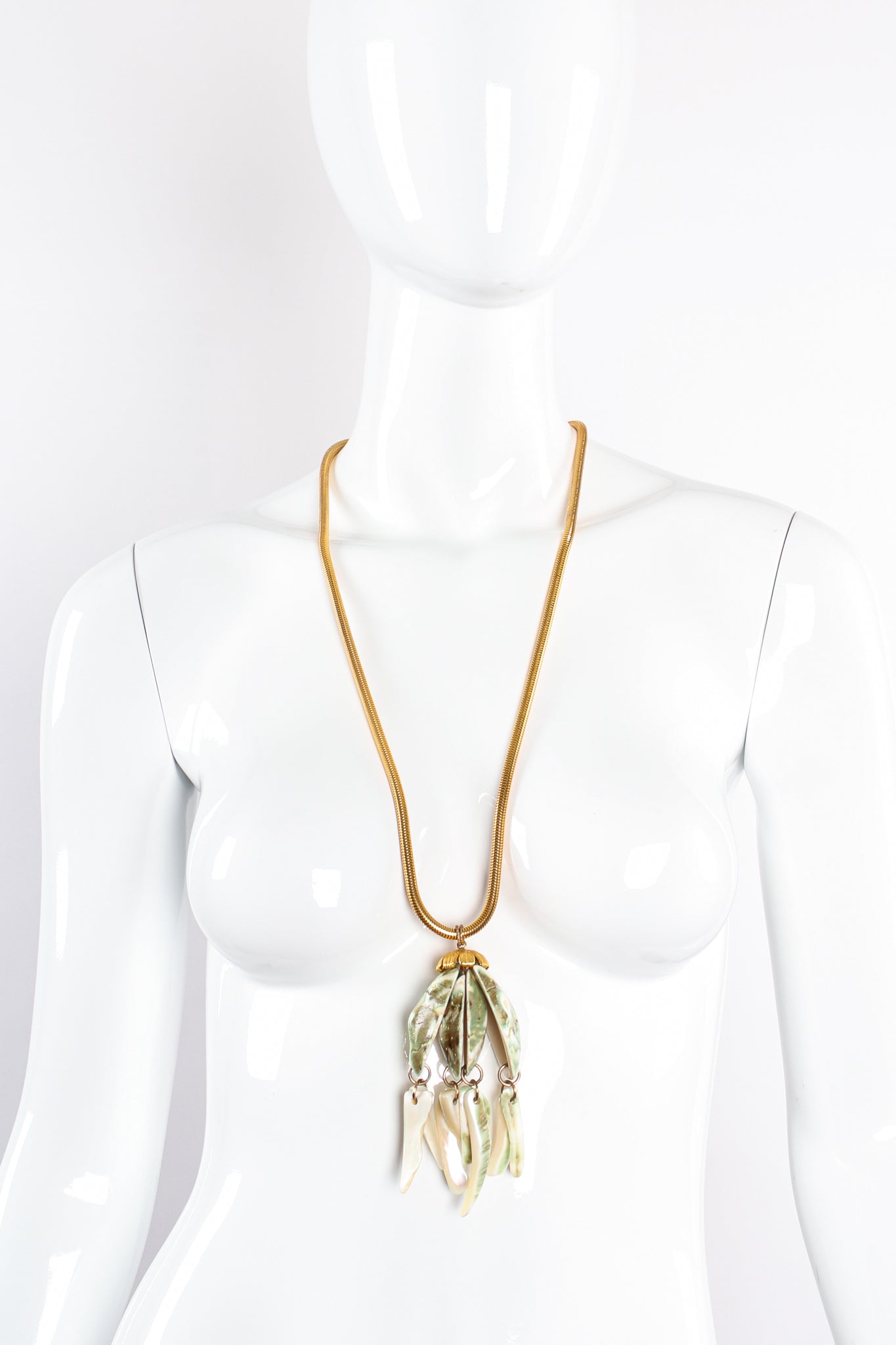 Vintage Unsigned William deLillo Polished Shell Pendant Necklace on mannequin at Recess Los Angeles