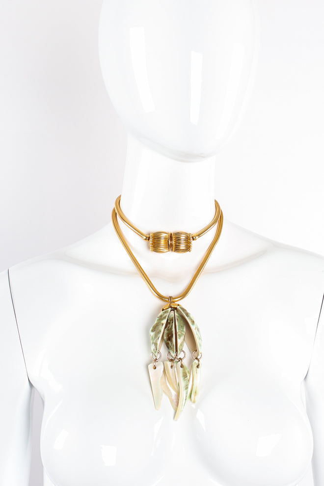 Vintage Unsigned William deLillo Polished Shell Pendant Necklace on mannequin at Recess Los Angeles