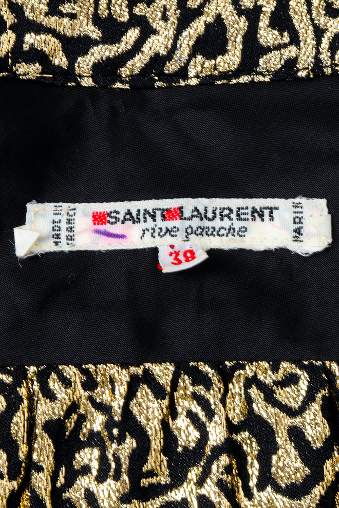 Vintage Yves Saint Laurent YSL Label on black fabric