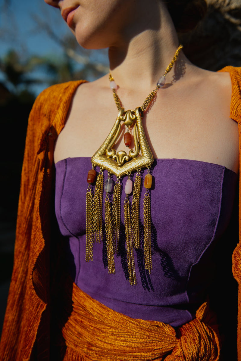 Vintage Unsigned Hammered Fringe Plate Necklace from Recess on model with purple shirt