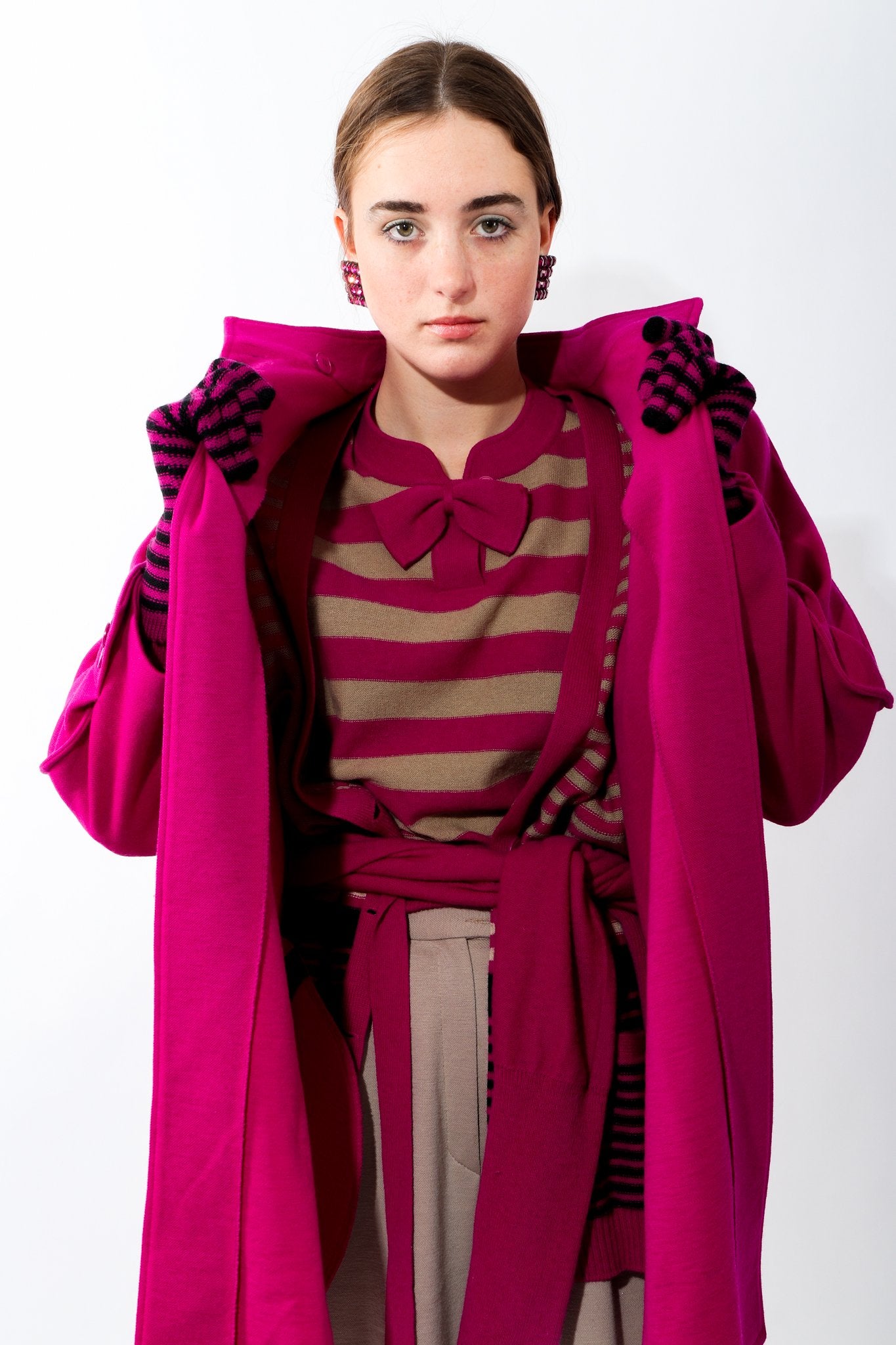 Girl wearing Vintage Sonia Rykiel Fuchsia Knit Cocoon Coat with striped sweater and striped gloves