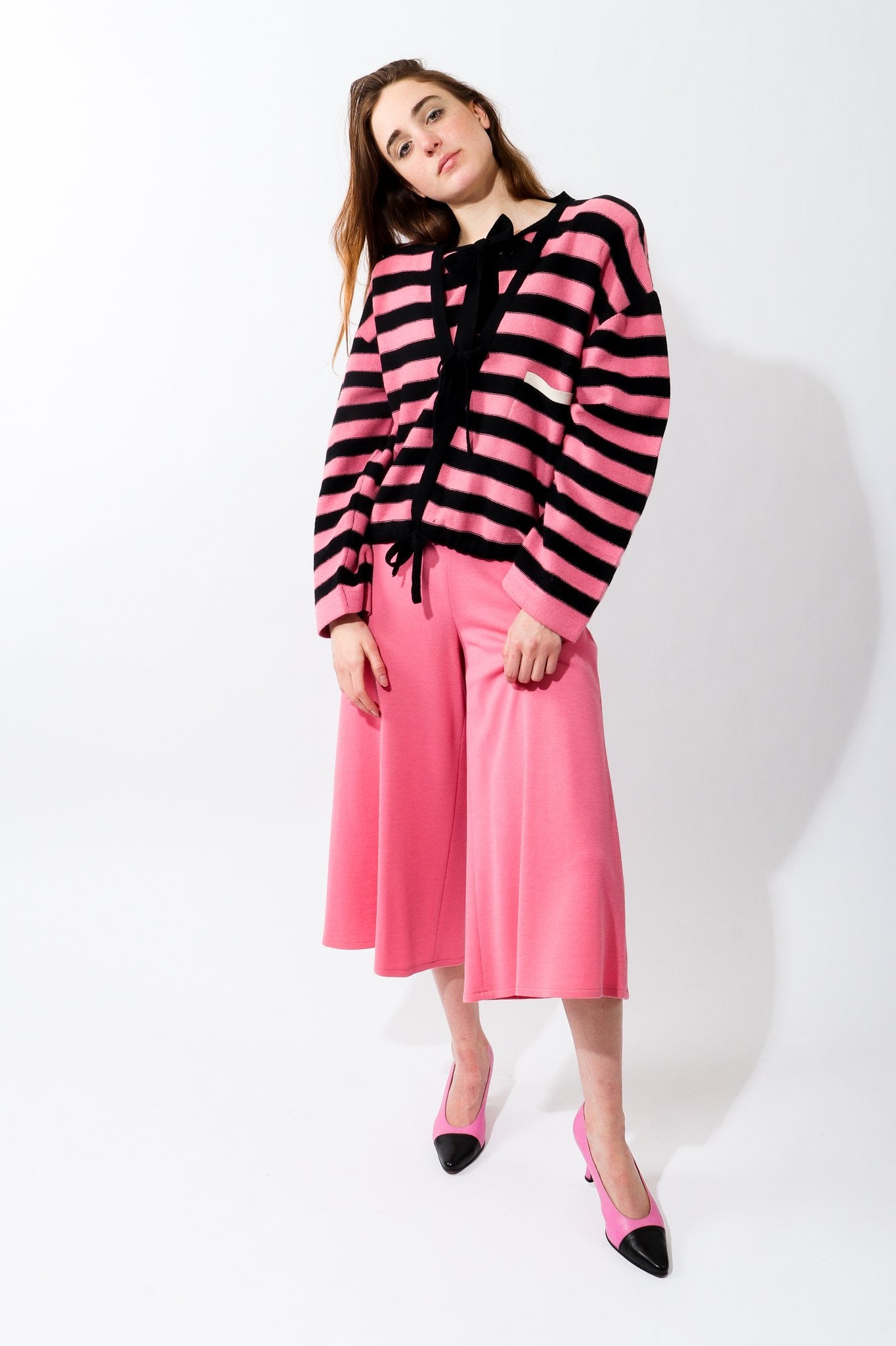 Girl in Vintage Sonia Rykiel Pink Stripe Knit Boxy Cardigan and pink pants