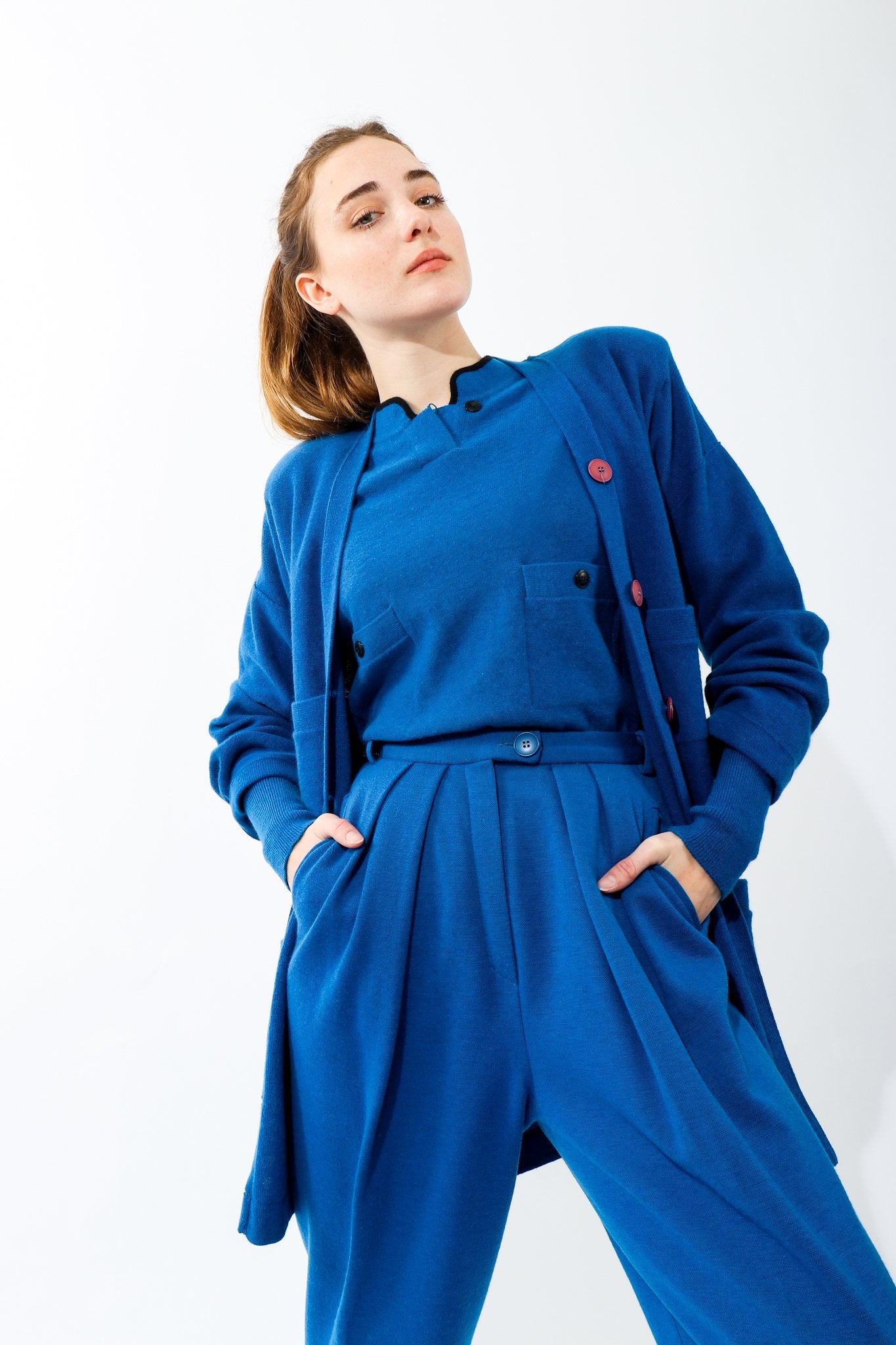 girl wearing Vintage Sonia Rykiel Blue Knit High Neck Sweater with matching cardigan and pant
