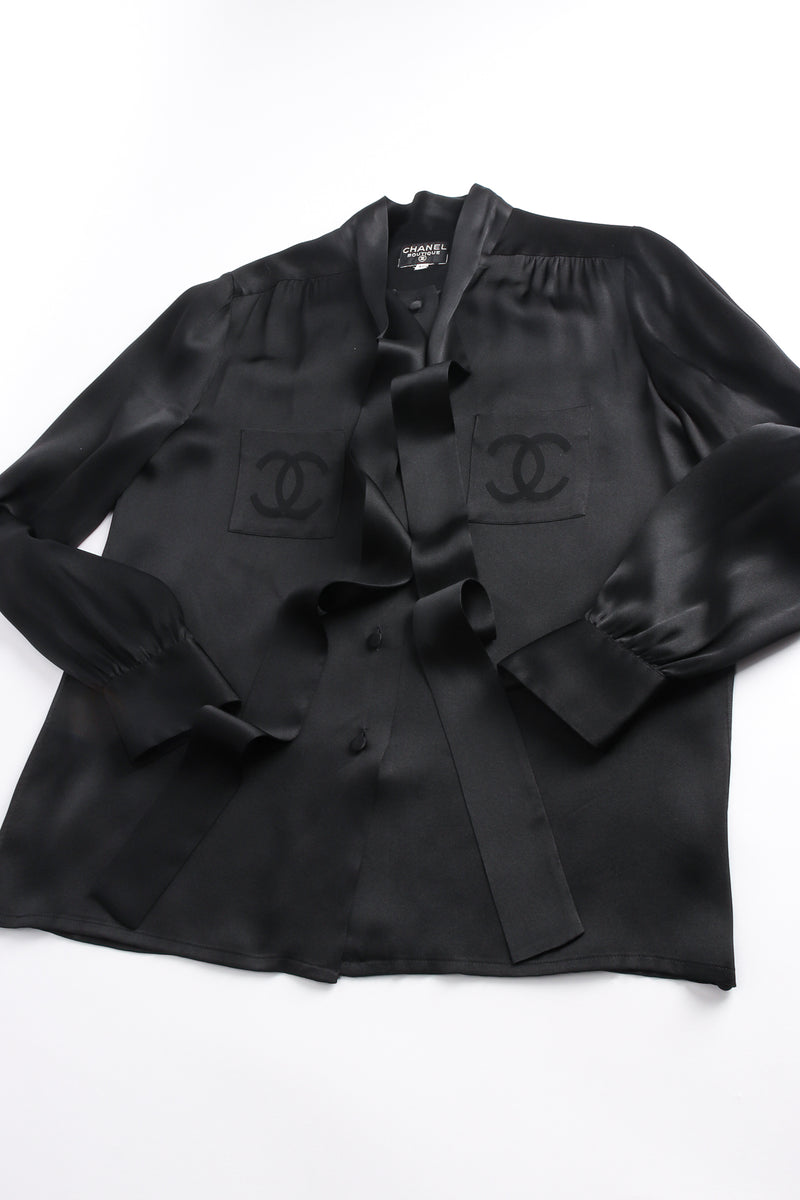 Vintage Chanel CC Pocket Black Silk Tie Neck Blouse flat at Recess Los Angeles